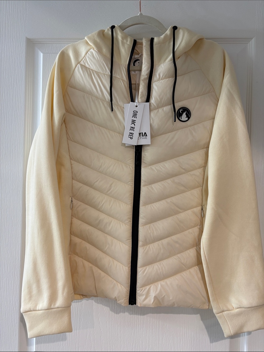 ZYIA Cream Courchevel Quilted Puffer Jacket with Black Trim